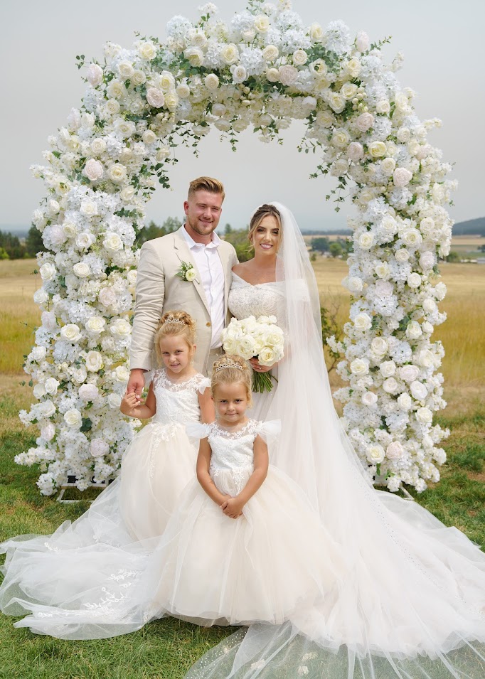 A Guide to Buying an Engagement Ring 8 Spokane wedding venue with bride & groom, flower girls and ring bearer
