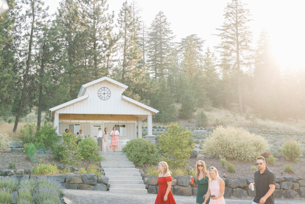 Wedding guests wearing garden party attire at a Spokane wedding venue