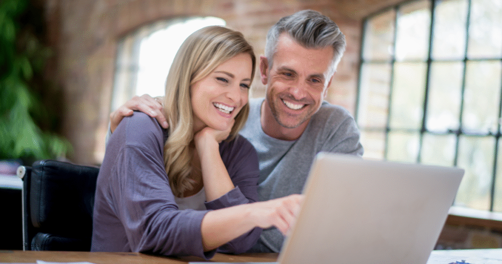 Bride and groom searching online for a Spokane wedding venue