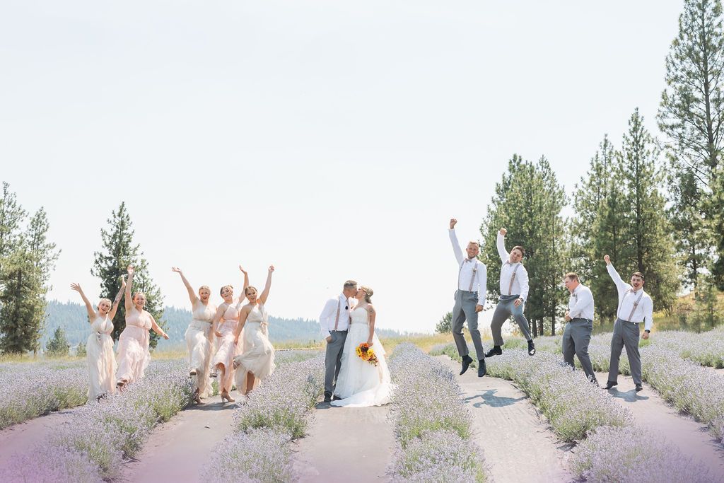 Wedding party pose for wedding day photos at our garden wedding venue near Spokane. Bay Street Photography
