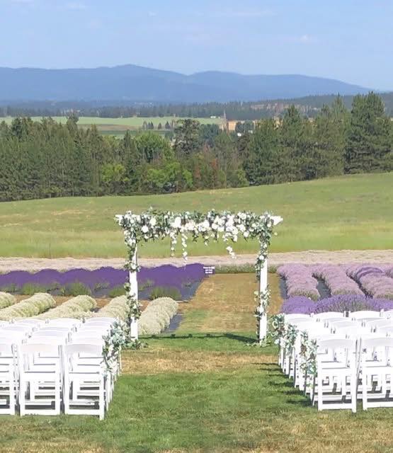 Outdoor wedding ceremony with lavender gardens, mountain views and gorgeous green landscapes near Spokane & Coeur D'Alene